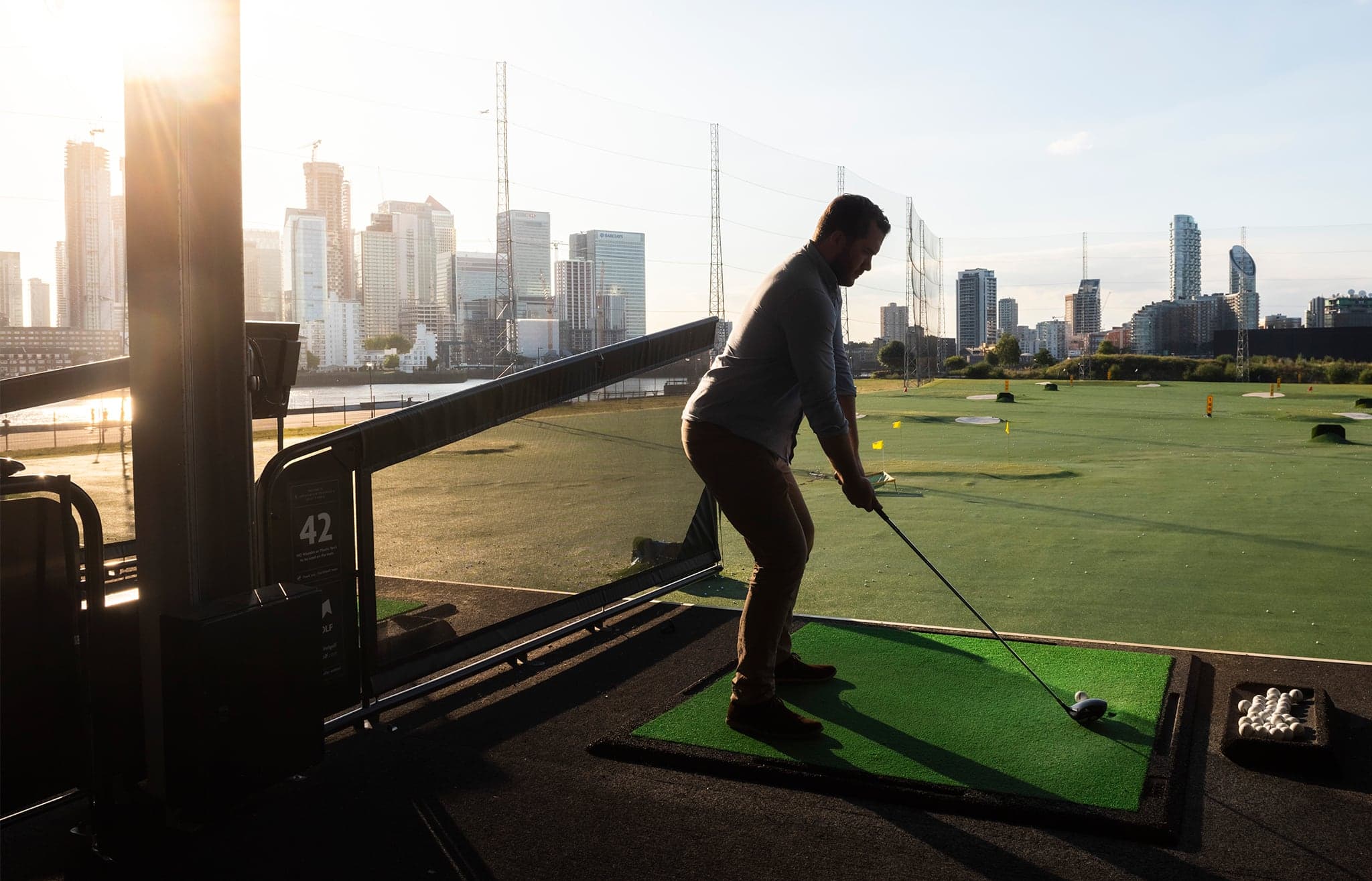 Man on driving range