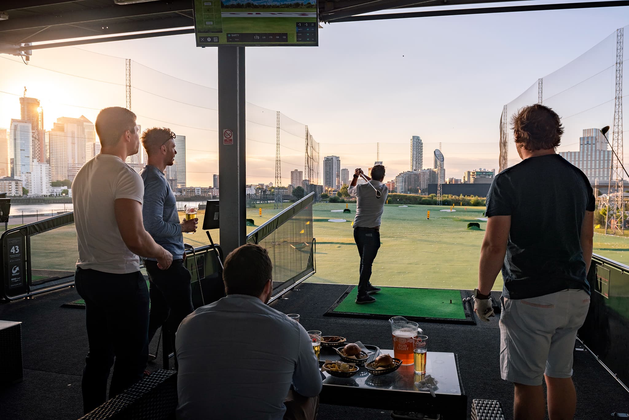 Group at driving range, evening