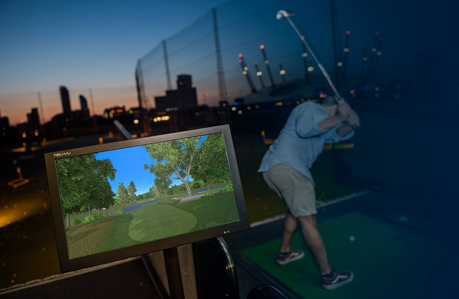 Man on driving range